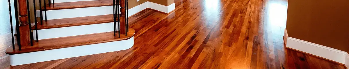Base floor of a staircase with professionally restored wood flooring in Miami FL