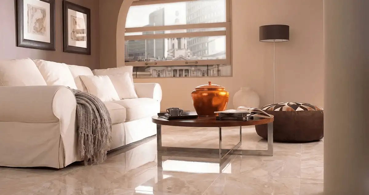 Modern living room with professionally installed marble flooring, a beige sofa, coffee table in Miami, FL