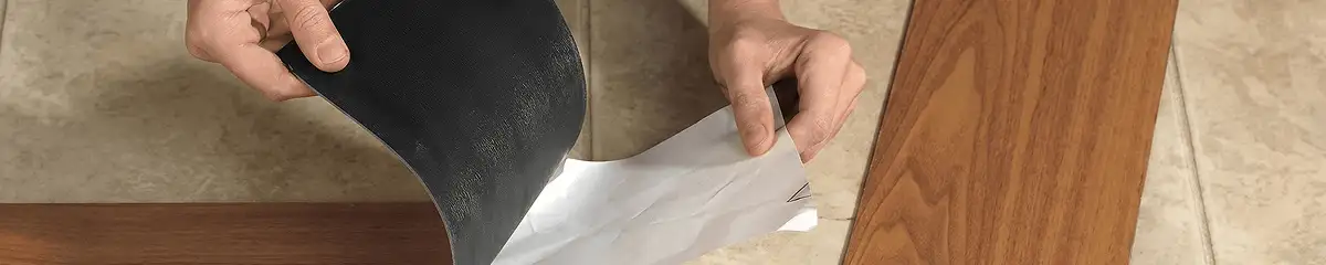A professional installing vinyl flooring in Miami, FL