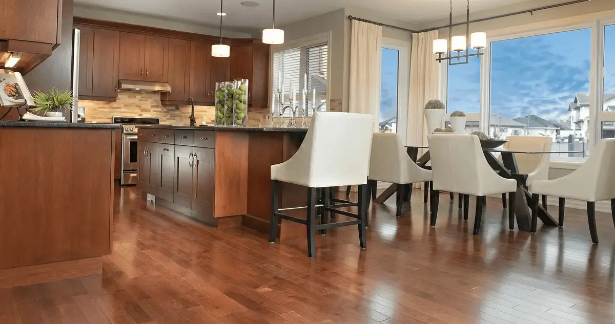 A modern kitchen with professionally installed wood flooring in Miami, FL